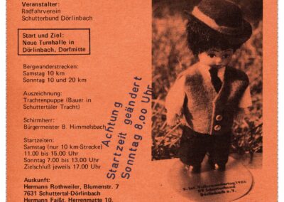 Flyer für die 5. Internationalen Volkswandertagen in Dörlinbach im Jahre 1986 (Deckblatt). Medaille: Dörlinbacher Trachtenträger als Puppe.