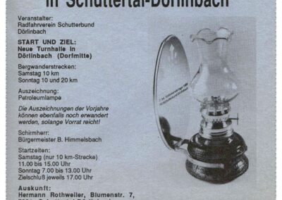 Flyer für die 7. Internationalen Volkswandertagen in Dörlinbach im Jahre 1988 (Deckblatt). Medaille: Mini-Petroleumlampe.